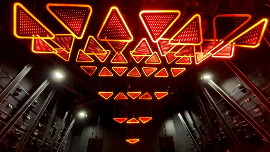 Triangular arc panels glowing orange