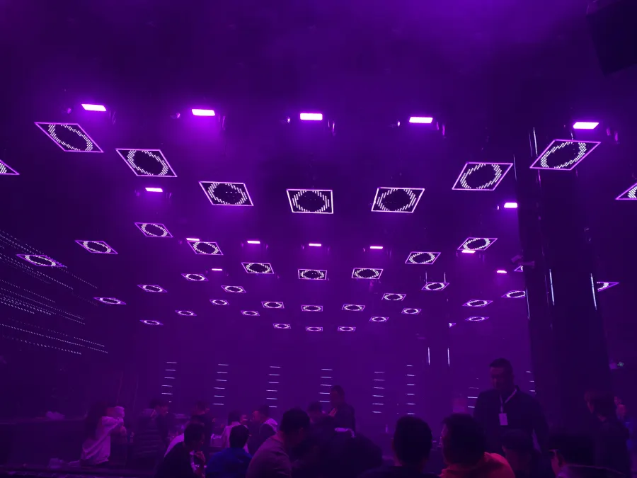 Square beam panels over a dance floor